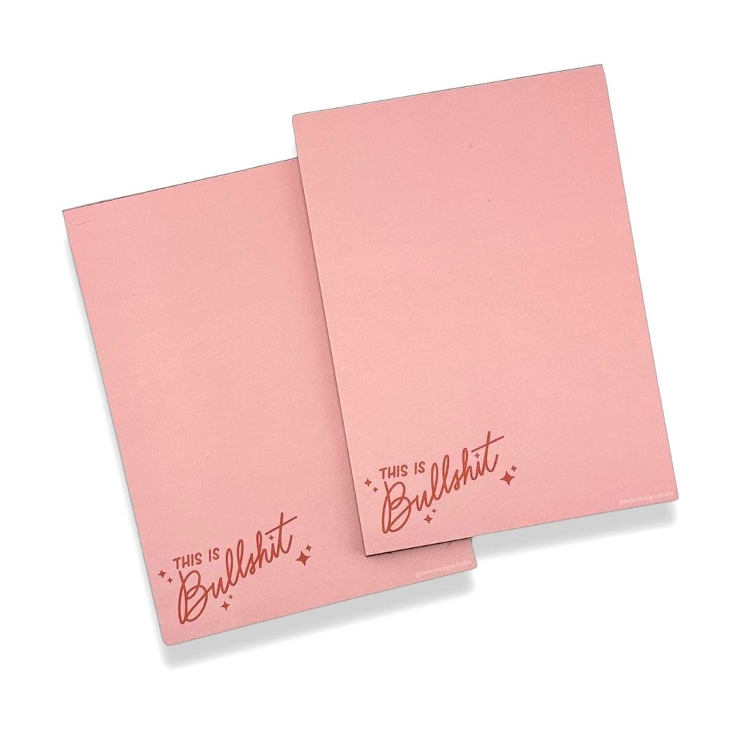two pink this is bullshit notepads