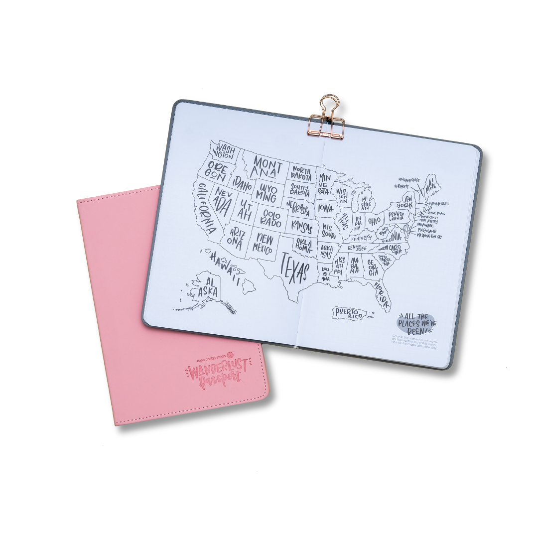 Wanderlust Passport Travel Journal in Dusty Pink with the US Map color-it-in page opened up
