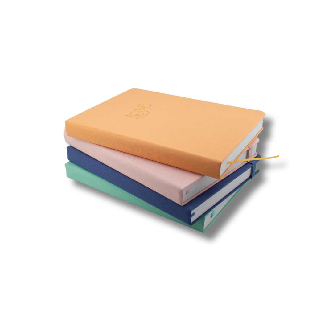 all four of the lined bobo journal stacked on each other