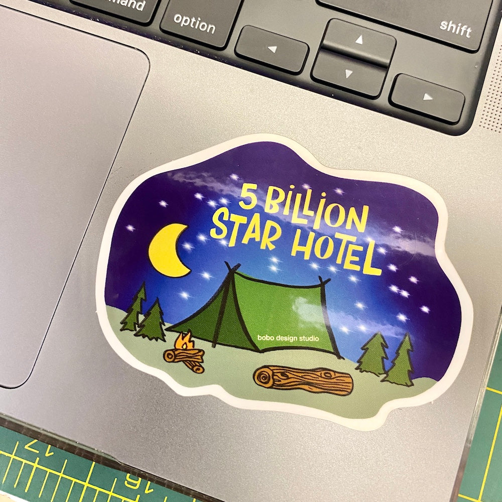 five billion star hotel sticker on a laptop