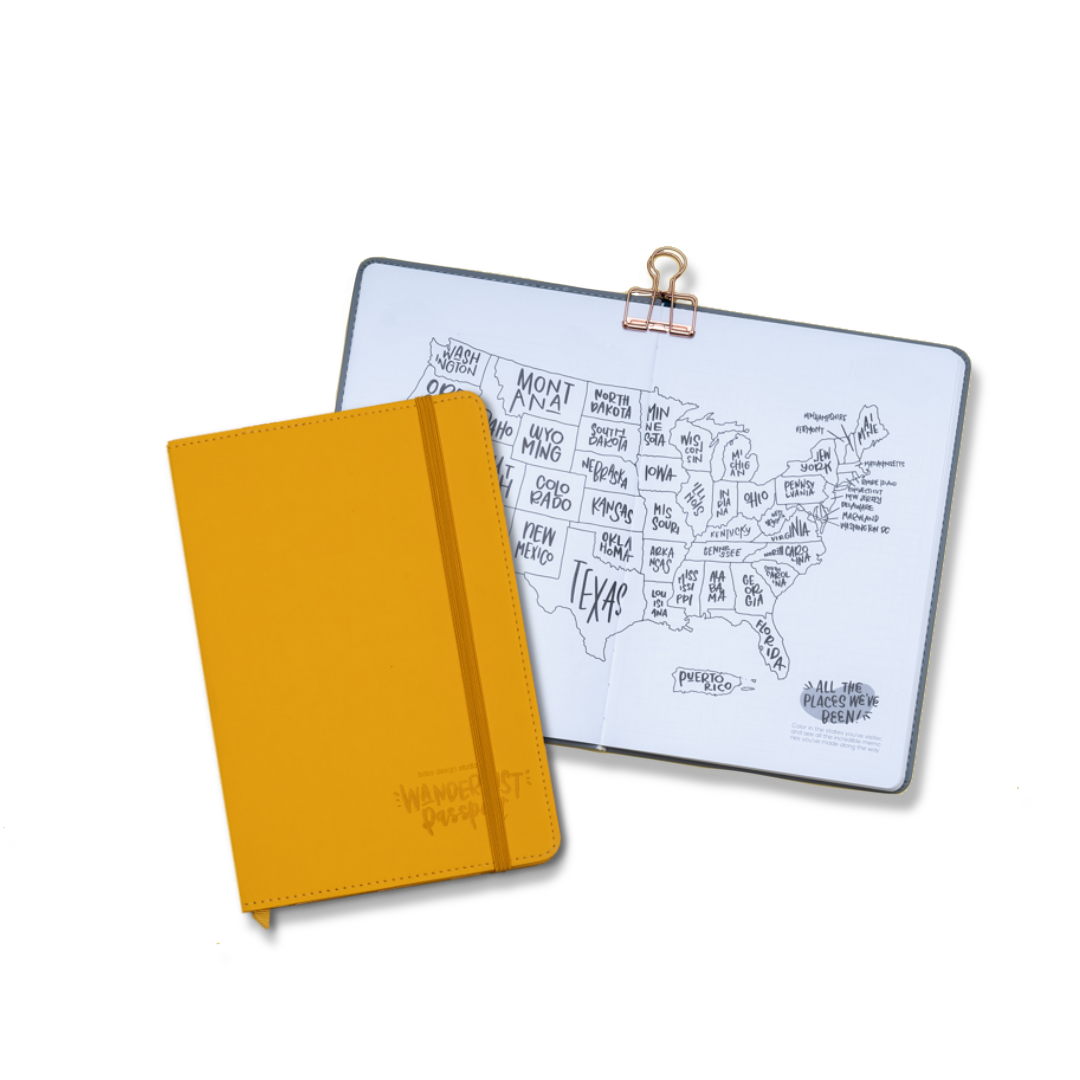 Wanderlust Passport Travel Journal in Goldenrod Yellow with an open page to the color-in US Map