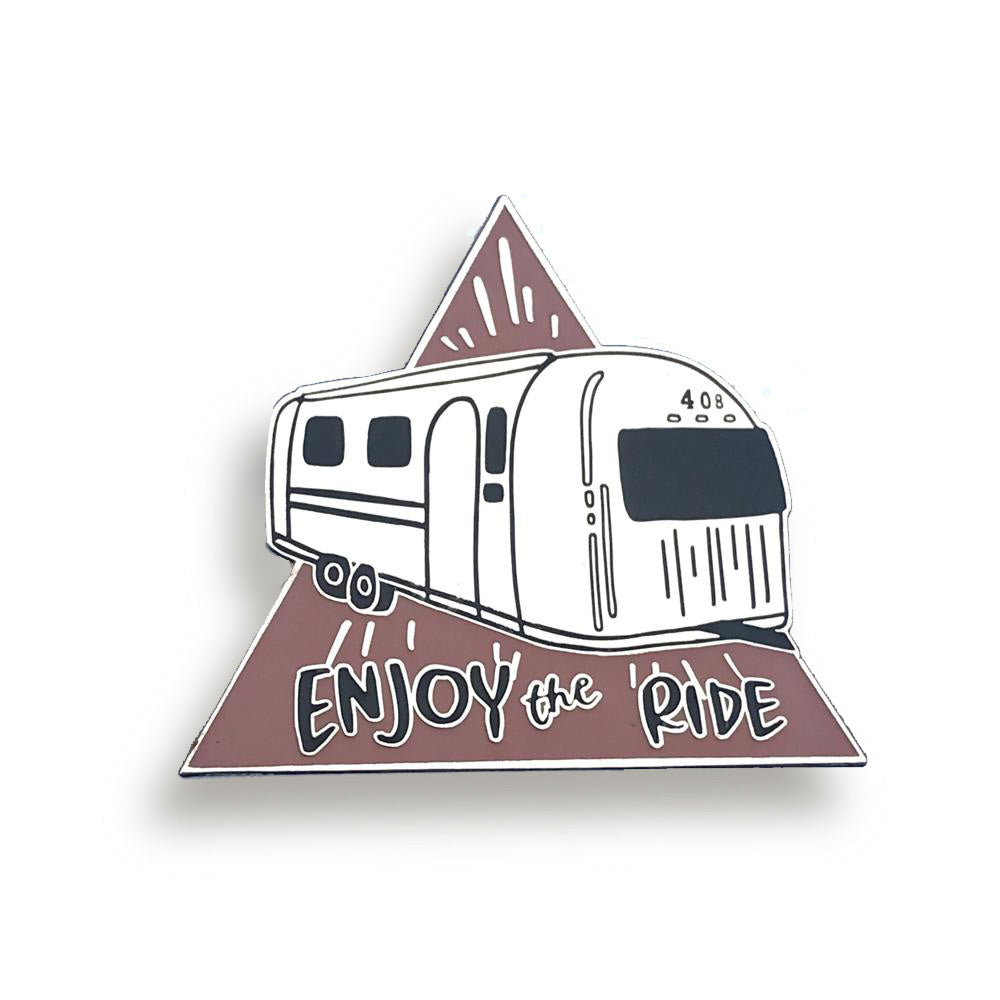 bobo design studio enjoy the ride airstream enamel pin on white background