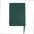 The back cover of the A5 bobo Black Dot Grid Journal in "Cactus" with a dark green smooth vegan leather cover. The end points where the elastic closure connects into the cover are visible. A matching green ribbon bookmark sticks out from the bottom of the journal. The corners of the cover furthest from the spine are rounded and not sharp.