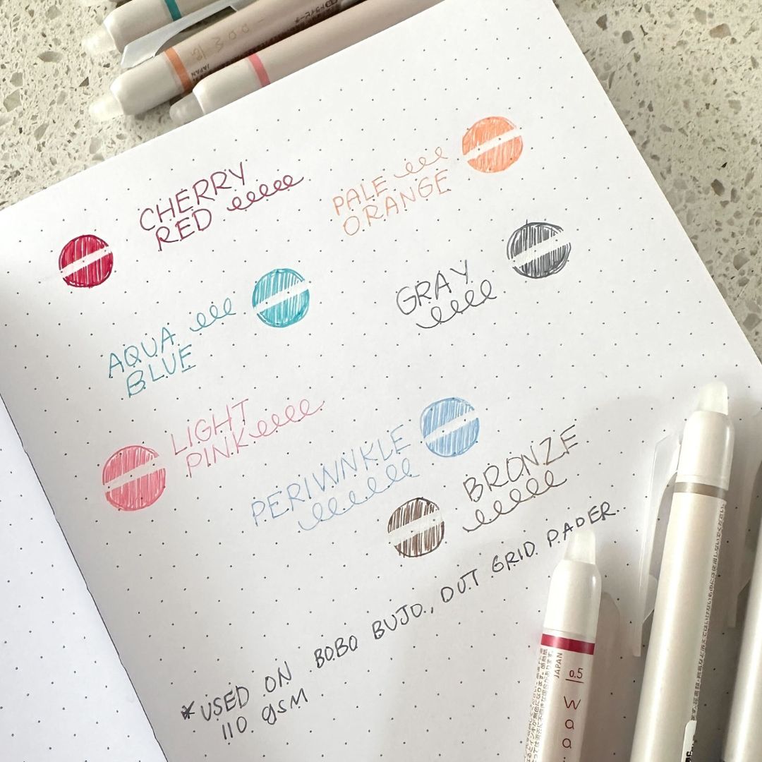 Color swatches of Frixxion Waai pens on a notebook page