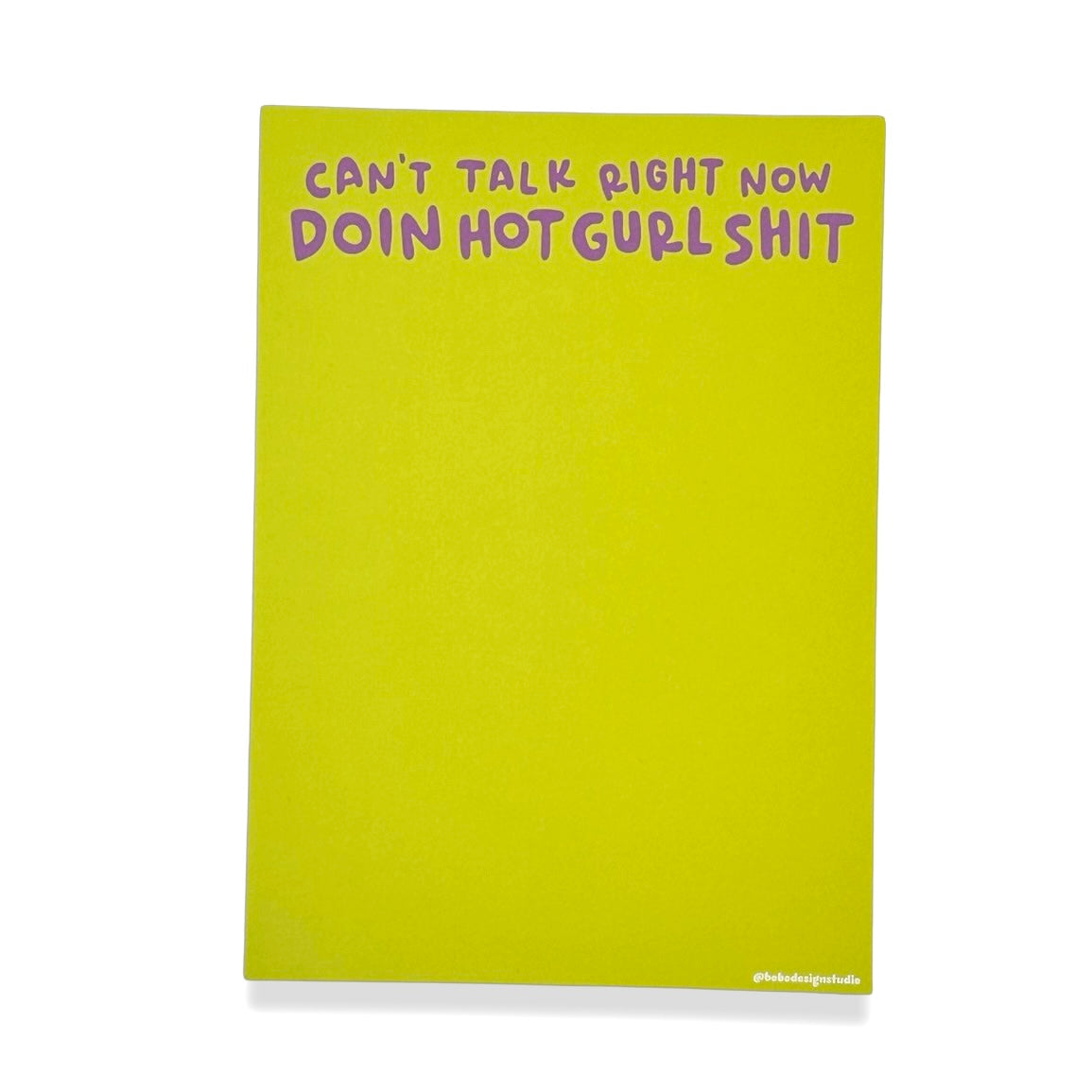 5 by 7 neon green notepad that says on the top "can't talk right now doin hot gurl shit" in purple text on the top of the pad