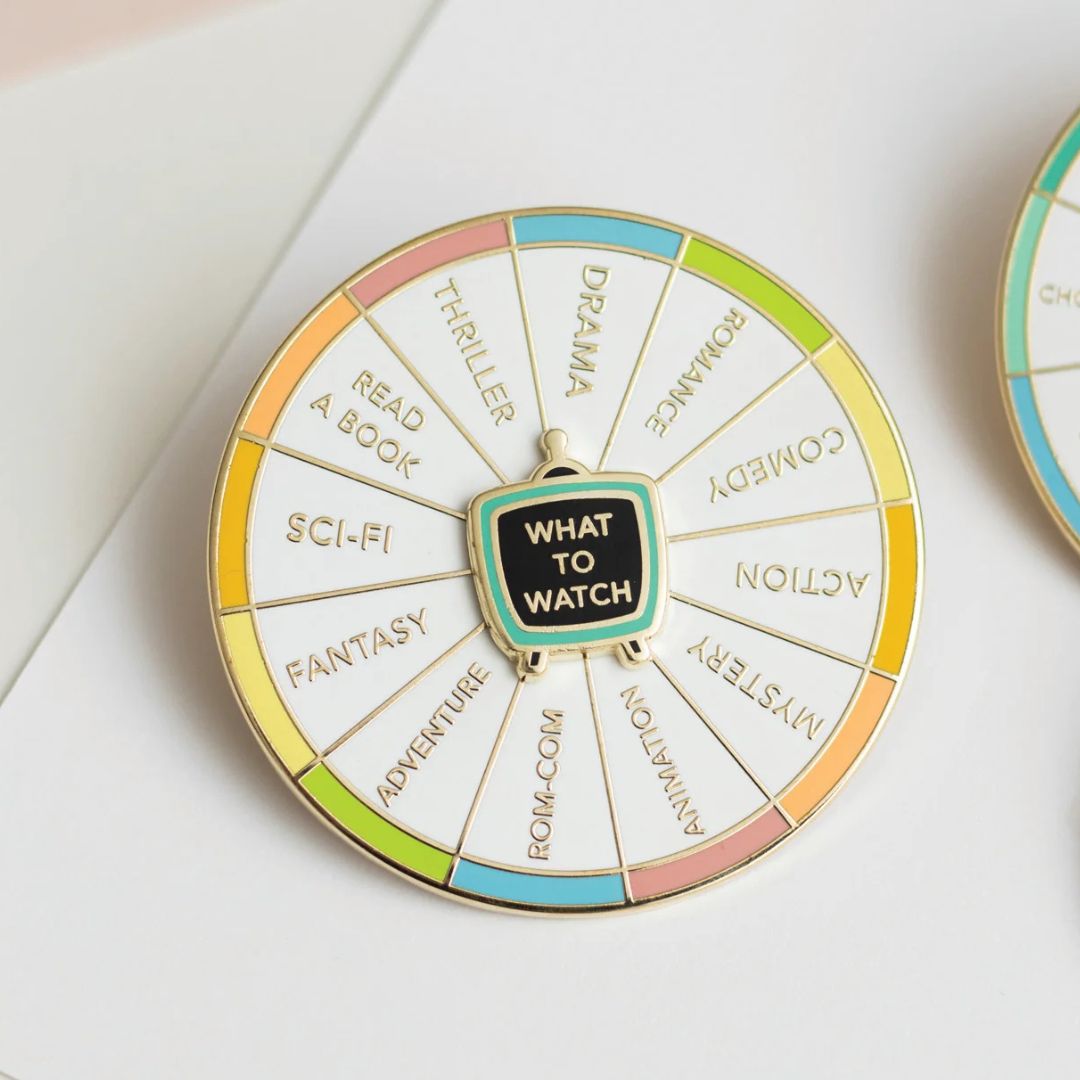 What To Watch - Spinning Enamel Pin - Occasionalish