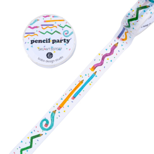 pencil party washi tape swatched on a white backdrop next to a roll with the label