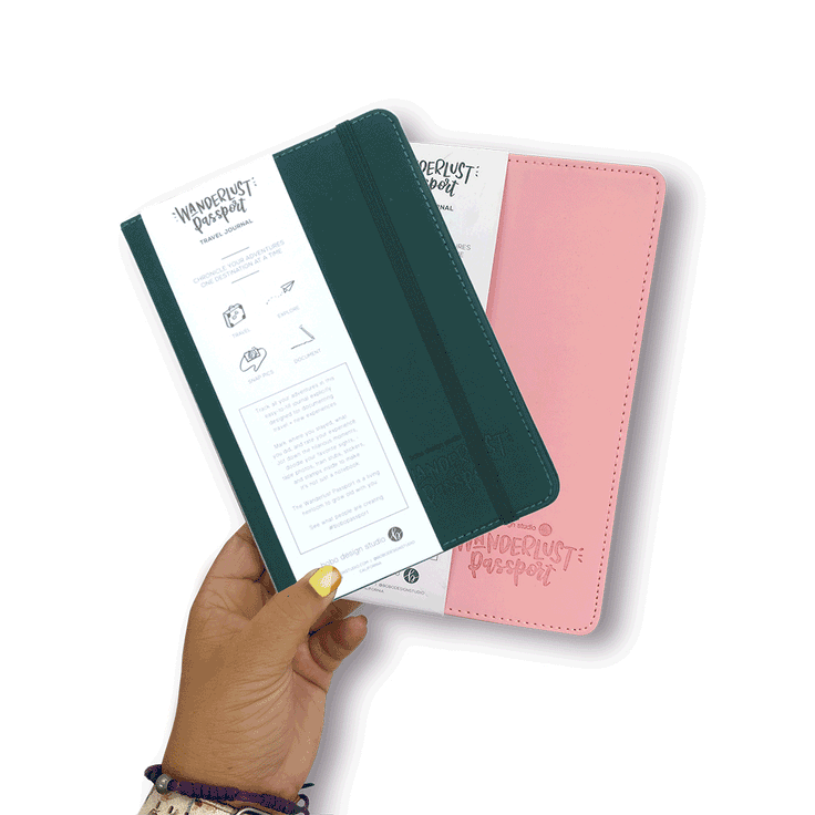 animated gif of a hand holding two wanderlust passport journals.