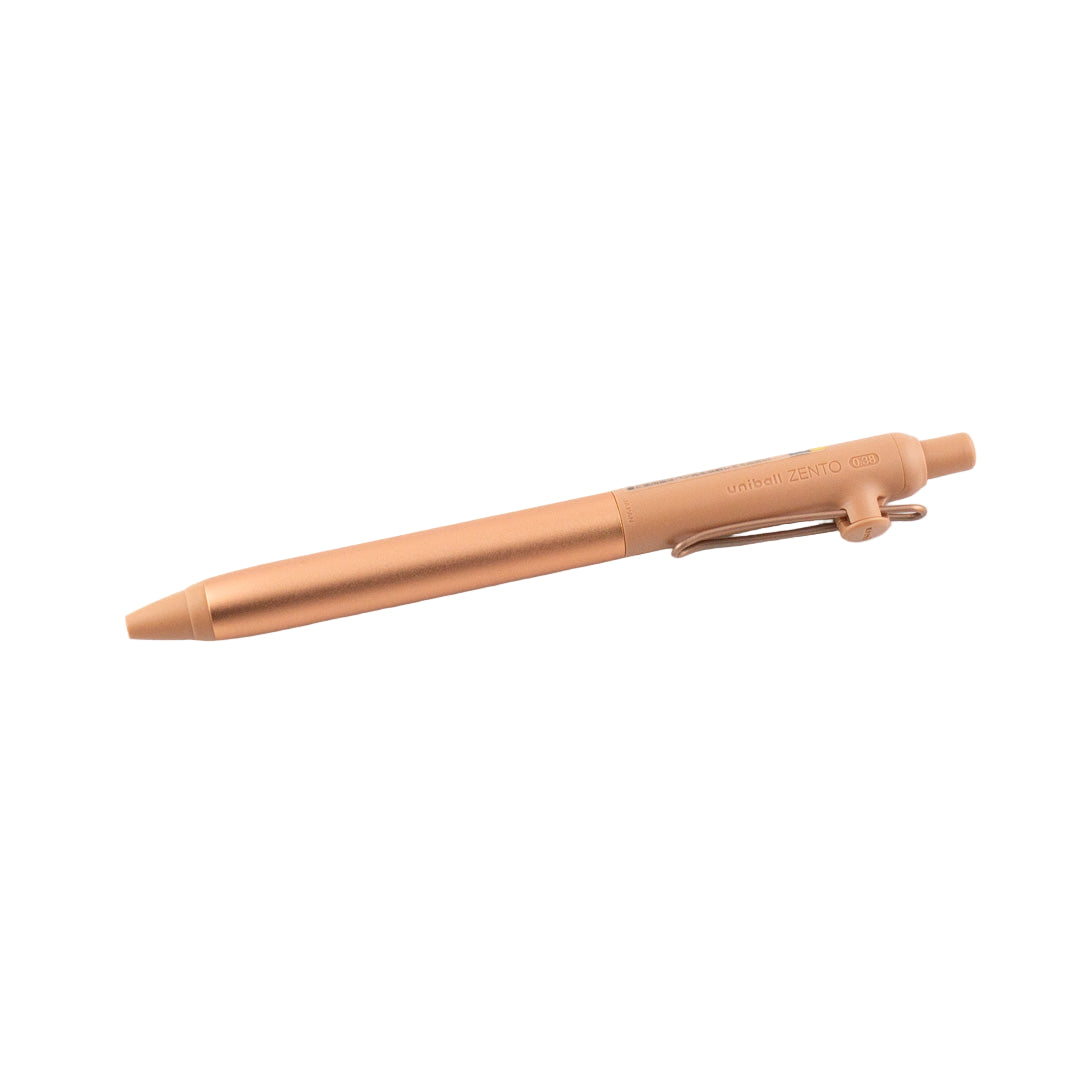 Rose gold pen on a white background