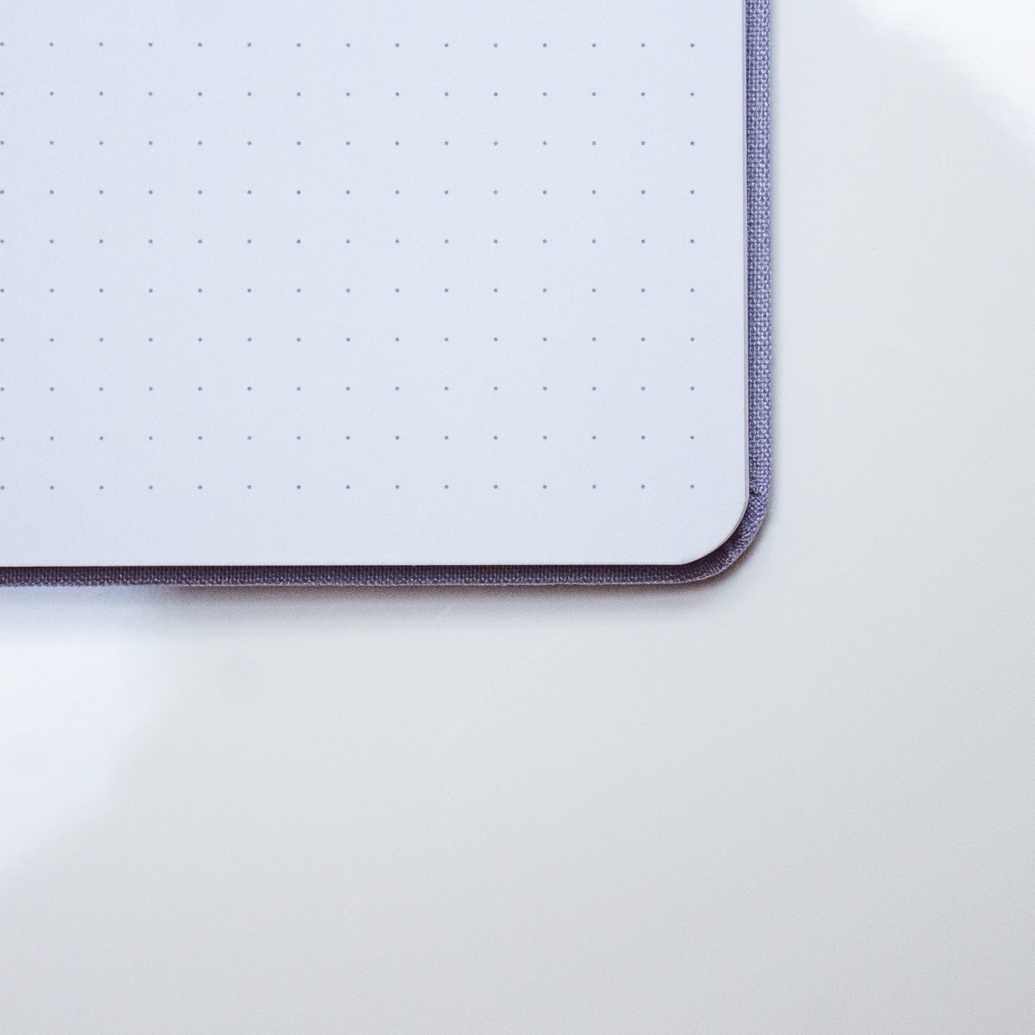 A close-up of the opened Cloud 9 dot grid journal, showing the white dot grid pages.