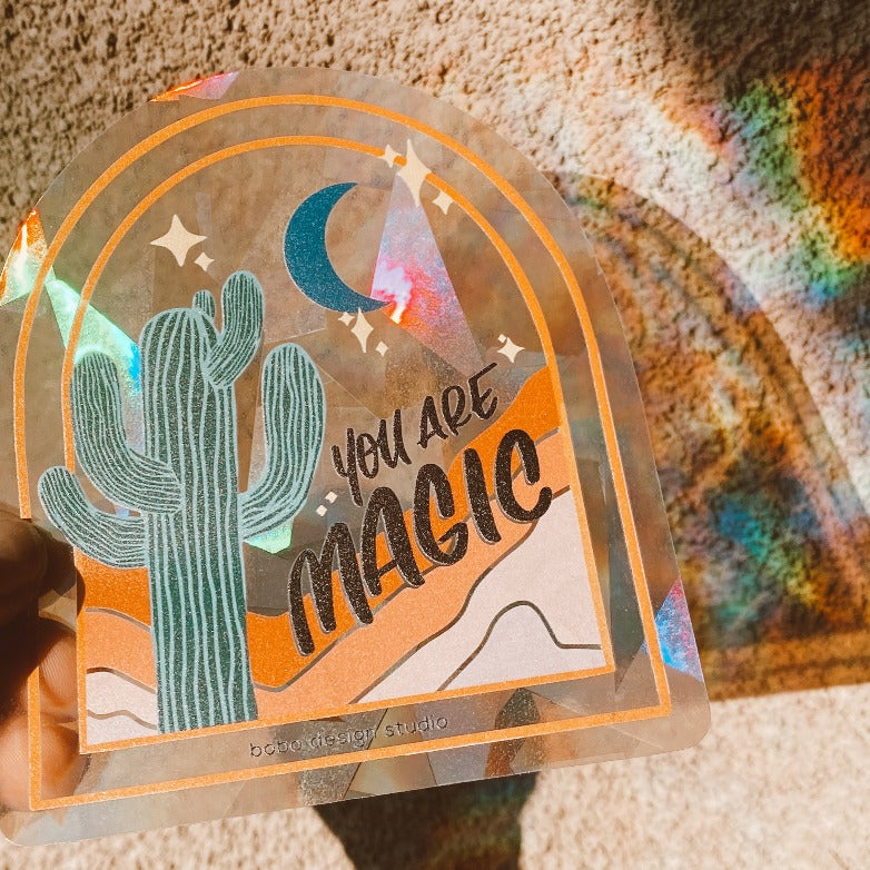 You Are Magic Sun Catcher Sticker displaying rainbows all over the place!