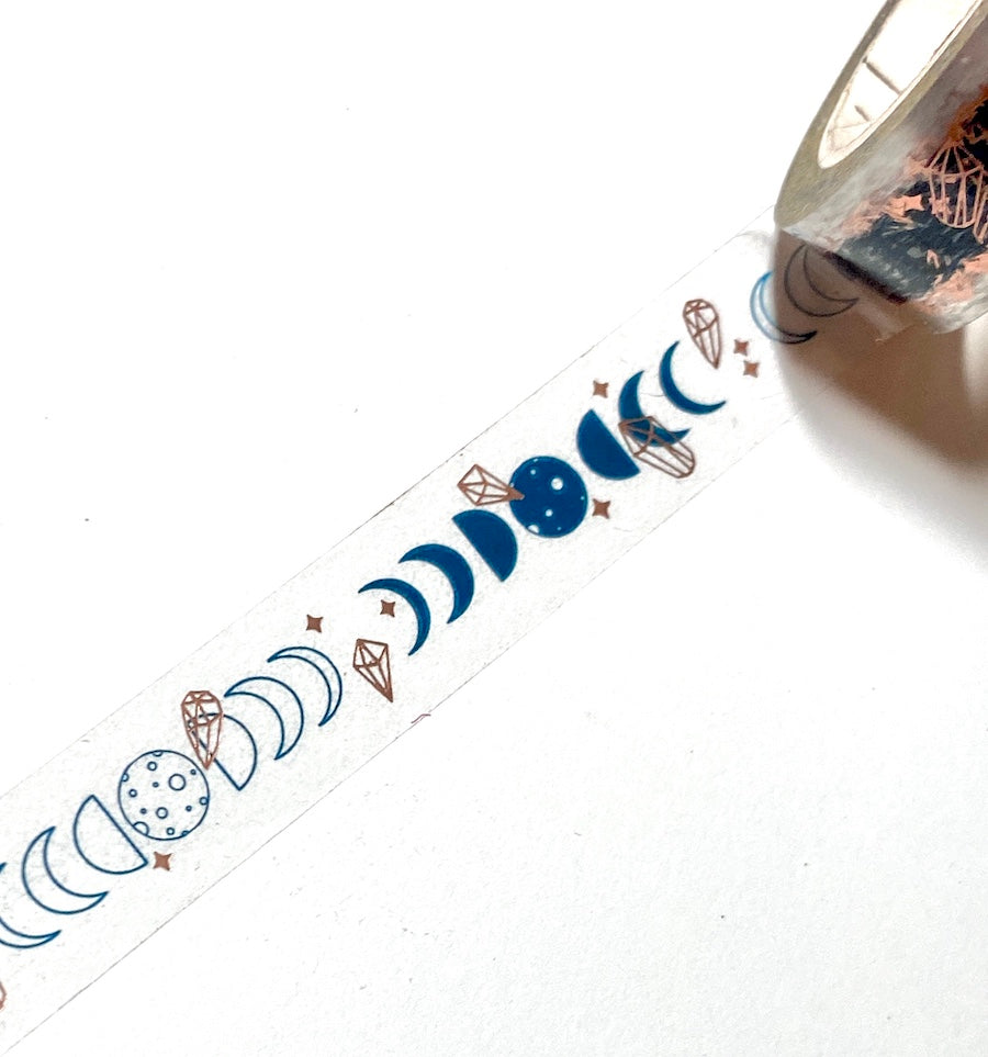 Close up of Moon Phases Clear washi tape with copper gold foiling