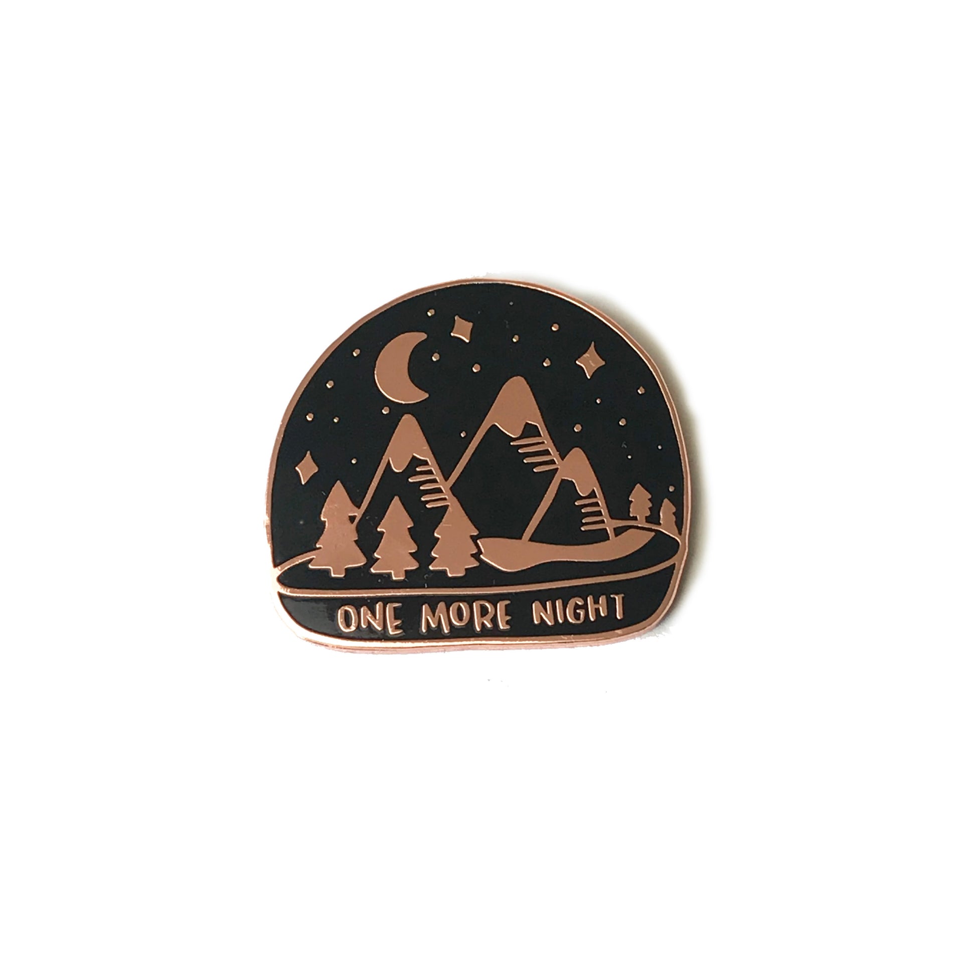 one more night enamel pin photographed on white background. Wholesale line sheet item