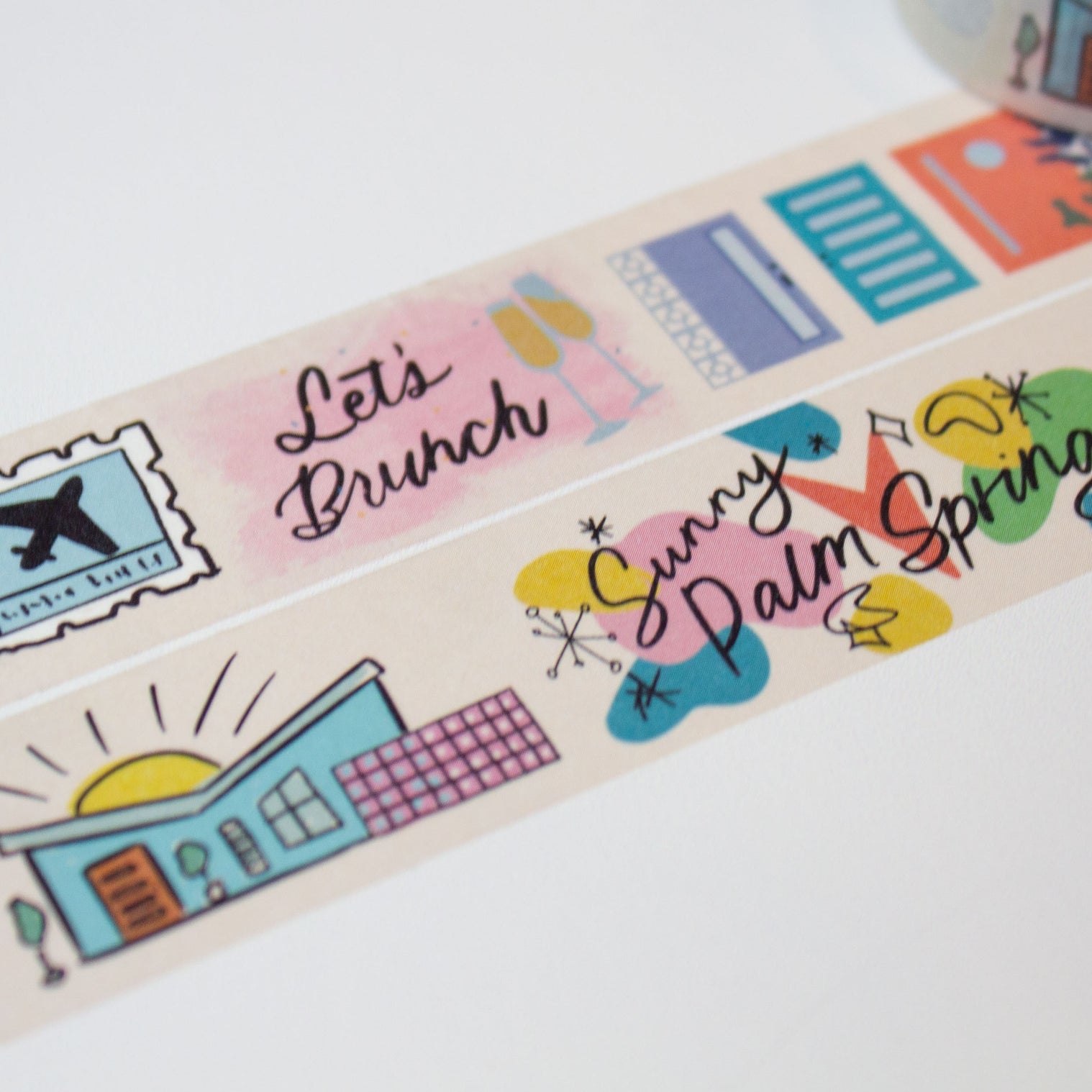 two palm springs washi tapes rolled out with various palm springs designs 