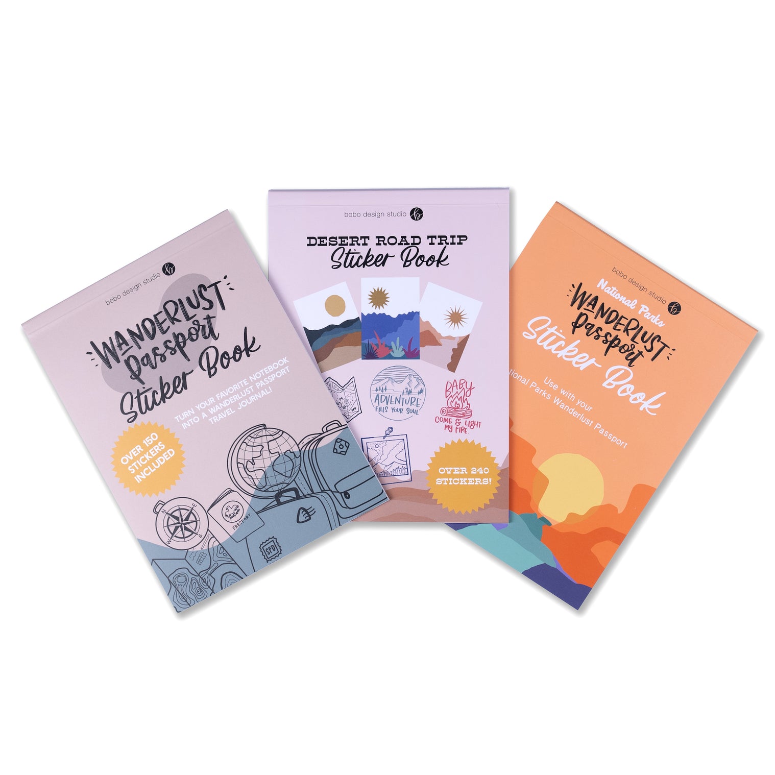 all three sticker books spread out like a fan. left wanderlust passport sticker book middle desert road trip sticker book and on the right national parks wanderlust passport sticker book 