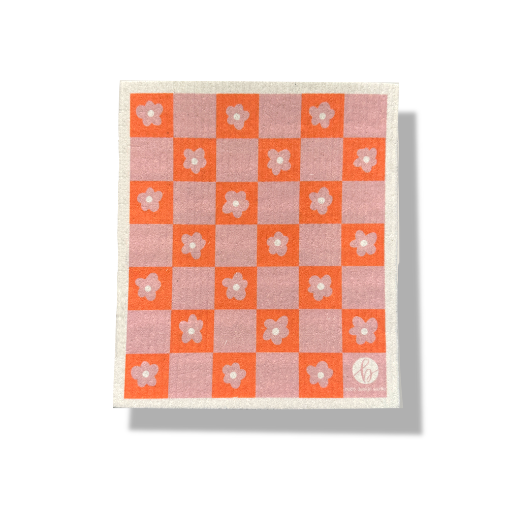 pink and orange checkers super cloth with a light pink flower on the orange tile