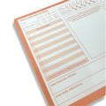 zoomed in image of left side of orange self care scratch pad 
